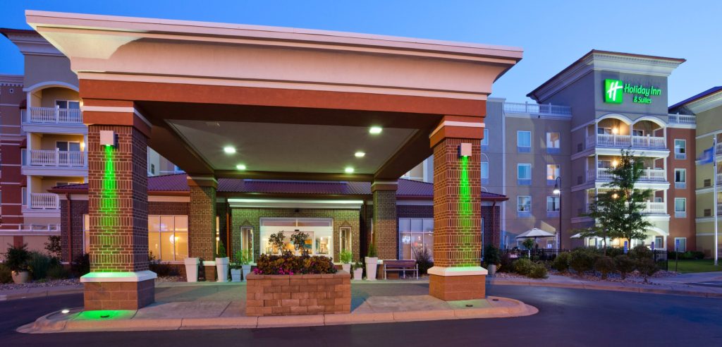 Holiday Inn and Suites Arbor Lakes Exterior at Dusk